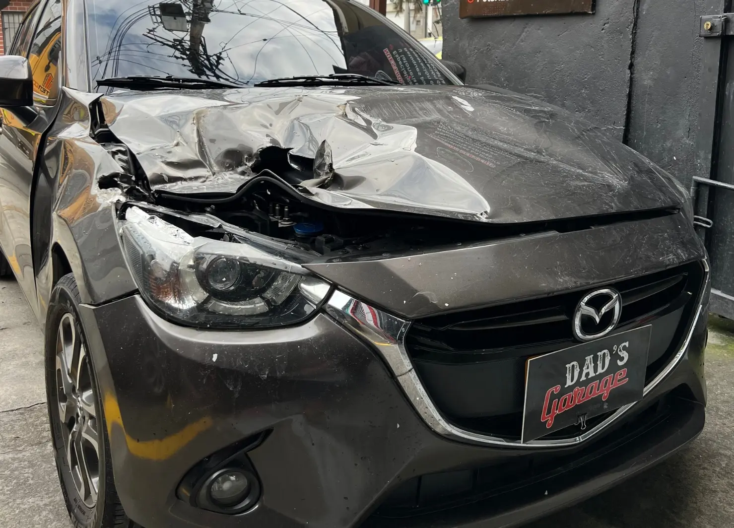 Latonería y Pintura Completa en Mazda 2